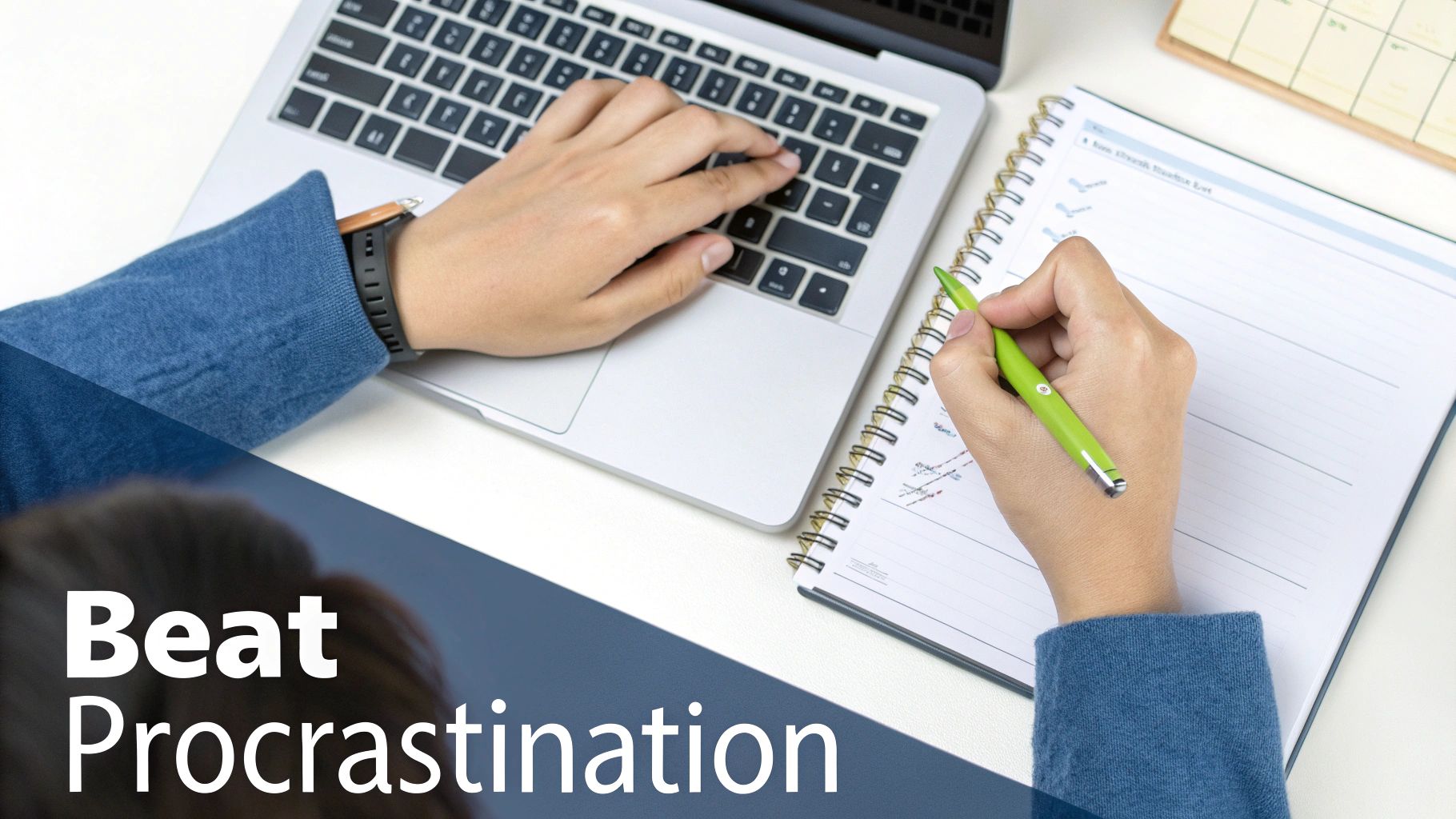 A person works at a desk, typing on a laptop and writing in a notebook, promoting productivity.