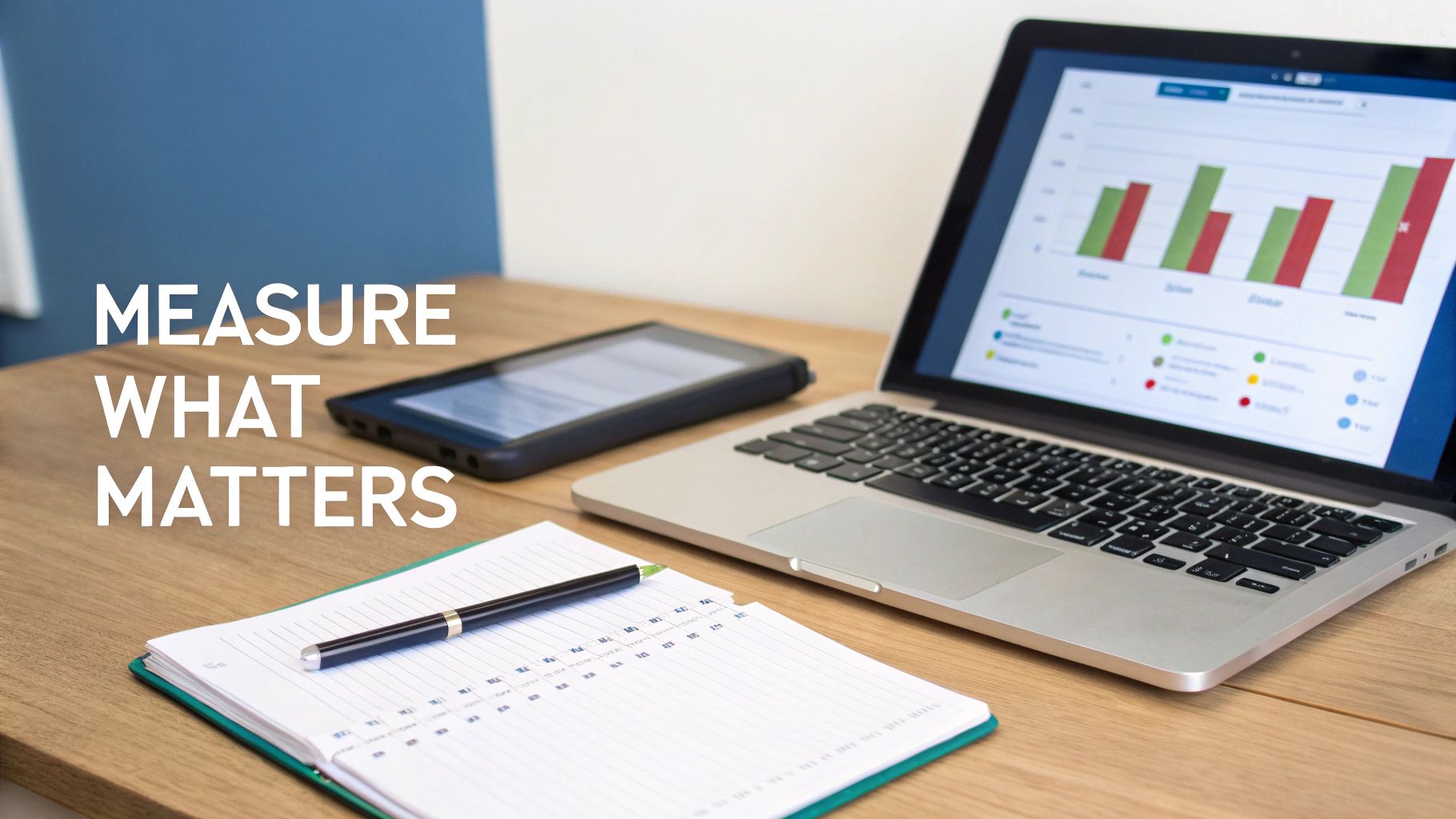 A laptop showing data charts on a desk with a tablet, notebook, and pen. Text: 'MEASURE WHAT MATTERS'.