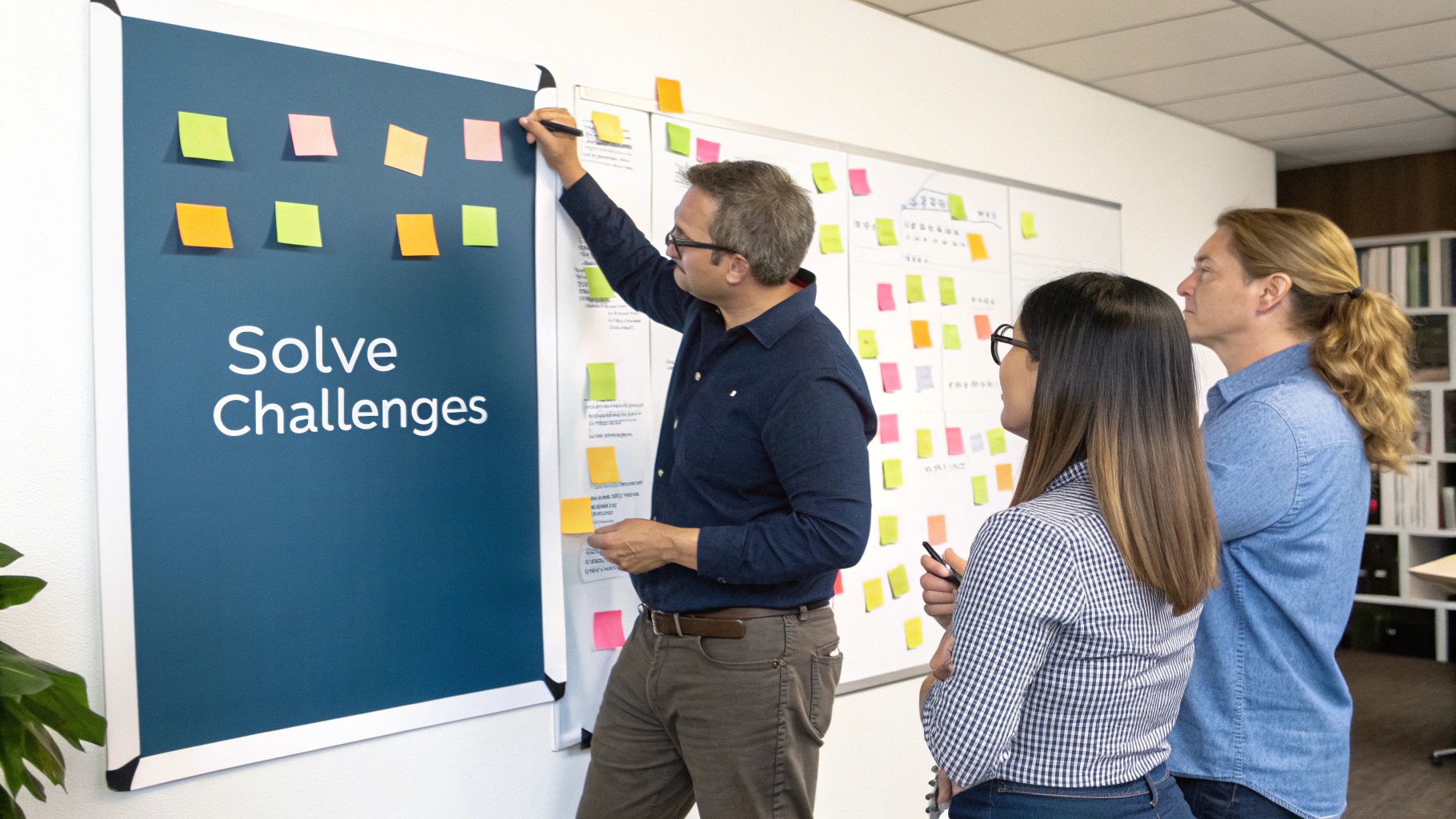 A person looking at a complex chart of intersecting lines, representing the challenges of resource planning.